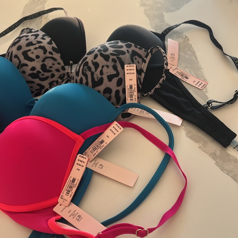 Brand New 4 Victoria’s Secret bikkini tops- Red/pink,Teal Blue, Leopard & black.